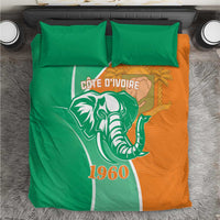 Green and orange Cote d'Ivoire elephant bedding set with matching pillowcases