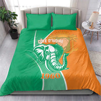 Cote d'Ivoire elephant duvet cover in green and orange with two green pillowcases