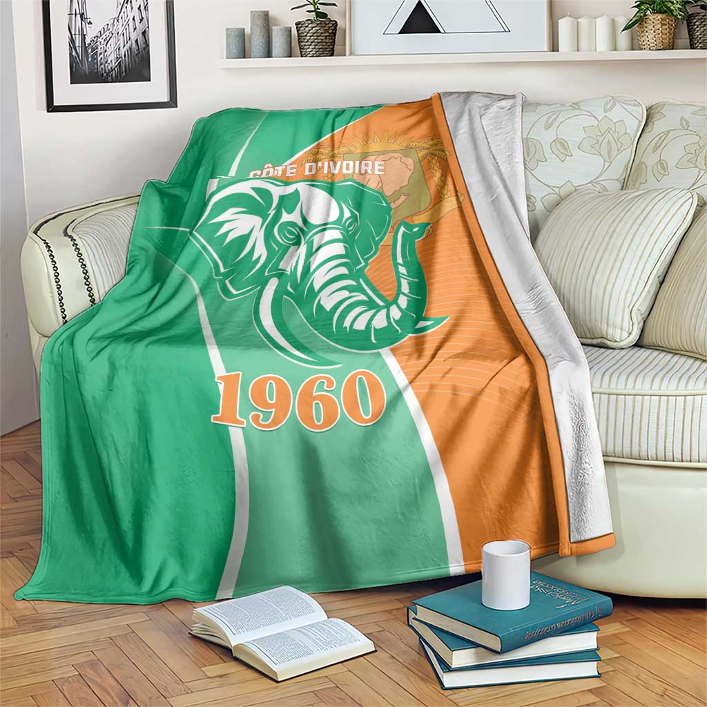 Cote d'Ivoire independence day blanket with elephant and 1960 print, green and orange