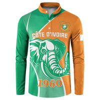 Green and orange button sweatshirt with elephant graphic, 1960, and Cote d'Ivoire text