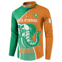 Front view green and orange button sweatshirt with elephant graphic and 1960 text
