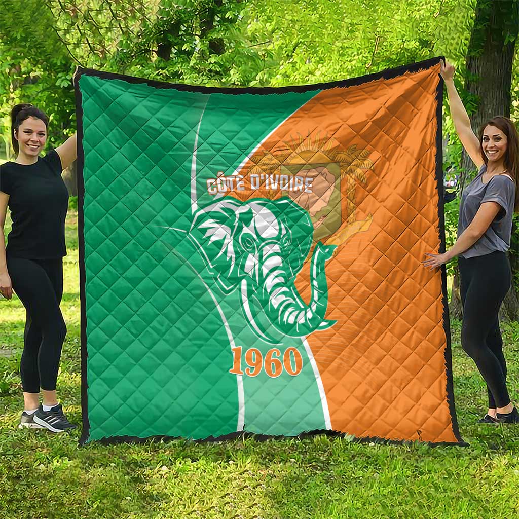 Green and orange Ivory Coast quilt with elephant emblem, Cote d'Ivoire text and 1960