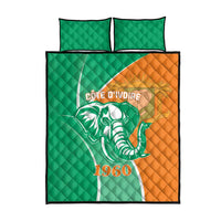 Green quilt bed set with orange panel, elephant graphic, 1960, and two pillowcases