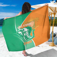 Ivory Coast sarong, green and orange with elephant and '1960' emblem