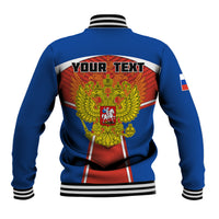 Back of blue baseball jacket with YOUR TEXT and ornate crest, striped ribbed hem