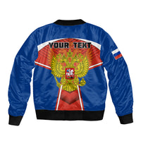 Blue bomber jacket with black ribbed collar and cuffs; back shows YOUR TEXT crest