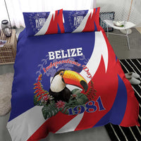 Blue duvet and matching pillow with toucan illustration and 1981 graphic over flag design.