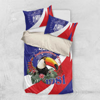 Blue duvet cover and pillow with toucan, Independence Day text, and 1981 badge design.