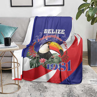 Belize Independence Day 1981 blanket on chair, blue/red/white flag with toucan design