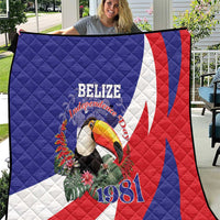 Blue, red and white Belize Independence 1981 quilt with toucan and floral print.