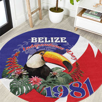 Round blue carpet with red/white stripes, toucan and tropical leaves graphic