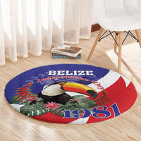 Round blue round carpet with toucan and tropical leaves, Belize Independence 1981