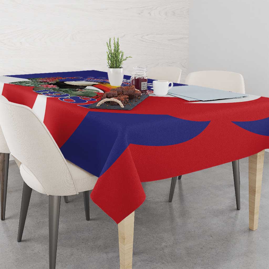 Colorful blue and red tablecloth with printed graphic and white accents
