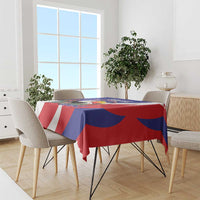 Blue and red tablecloth with white diagonal design on dining table