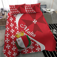 Red duvet and pillowcases with Malta crest, Maltese cross star pattern, and red geometric shapes