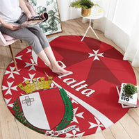 Red round carpet with Maltese cross shield, 'Malta' lettering, and star pattern