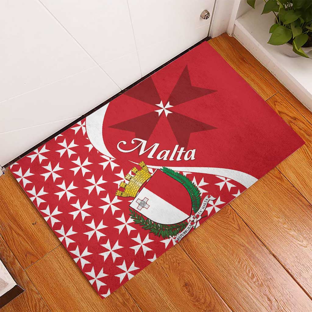 Red rubber doormat with Malta script, shield crest, and Maltese cross starburst design