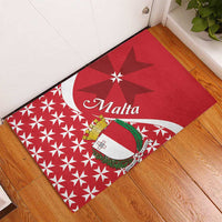 Red rubber doormat with Malta script, shield crest, and Maltese cross starburst design