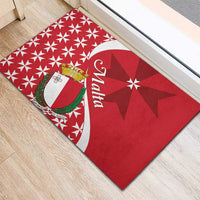 Red rubber doormat with white curved band, Malta crest, and Maltese cross pattern