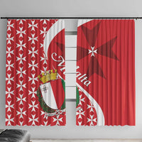 Pair of red Maltese cross curtains with crest emblem and draped folds.