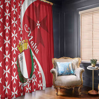 Red Maltese cross curtain panels with crest emblem beside a chair and side table.