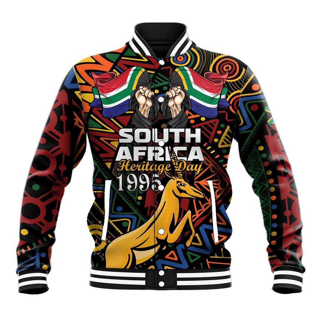 Black varsity baseball jacket with South Africa Heritage Day 1995 print and springbok