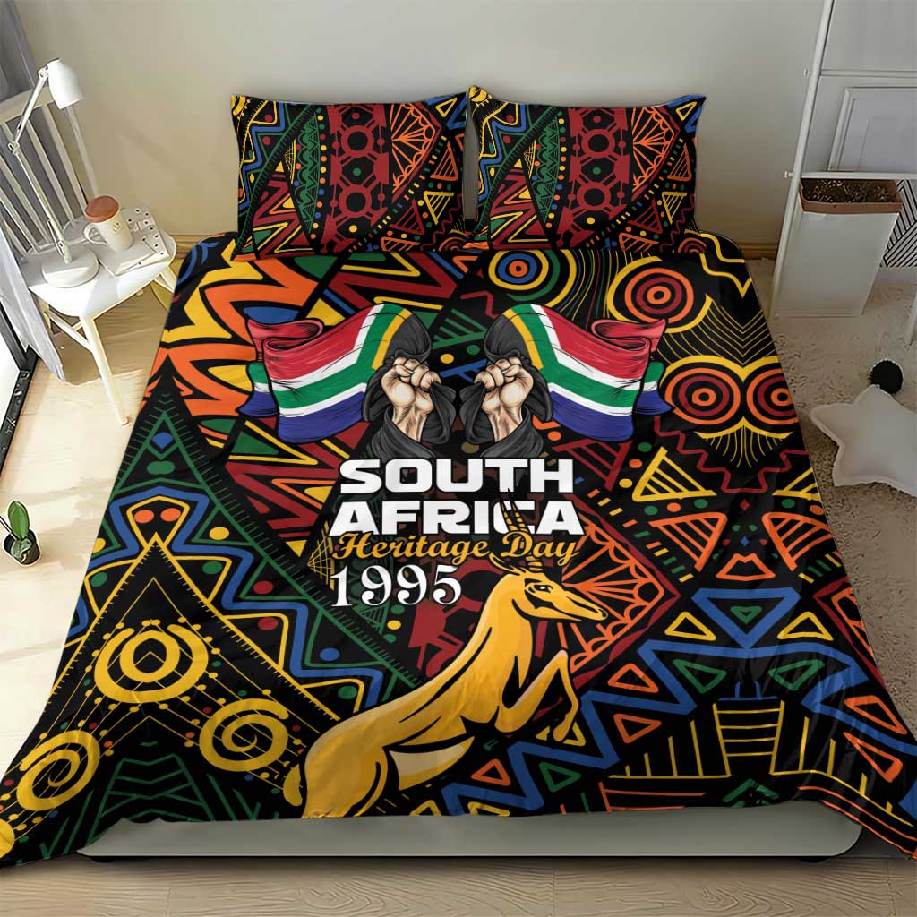 Bedding set with geometric springbok artwork, two pillowcases, and 'Heritage Day 1995' text