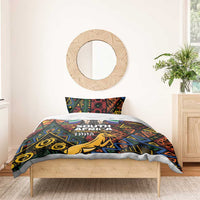 Bedding set with geometric springbok design, duvet and pillow, featuring Heritage Day 1995 text