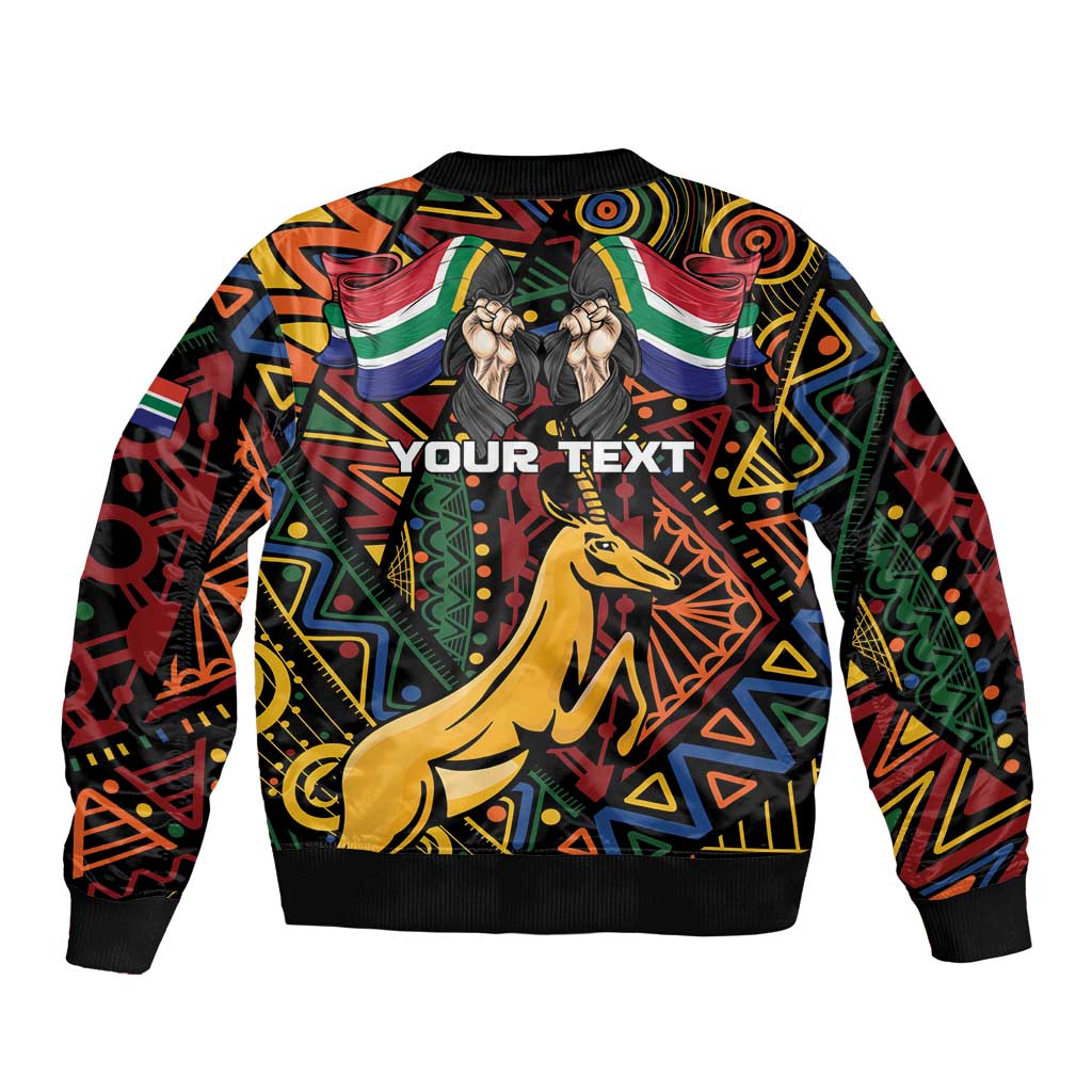 Black bomber jacket back with vivid African pattern, bold text area, springbok graphic