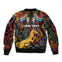 Black bomber jacket back with vivid African pattern, bold text area, springbok graphic