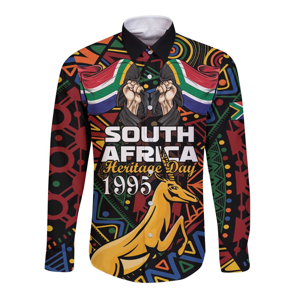 Long-sleeve button shirt front with colorful South Africa heritage graphic and springbok
