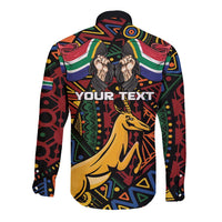 Long-sleeve button shirt with colorful African heritage graphic and springbok on dark base