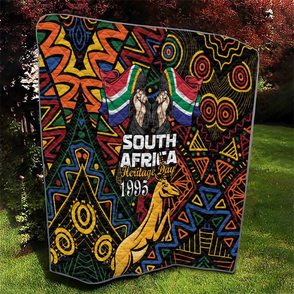 South Africa Heritage Day quilt with springbok graphic and bold geometric shapes.