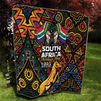 South Africa Heritage Day quilt with springbok graphic and bold geometric shapes.