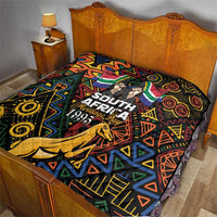 South Africa Heritage Day quilt with springbok, colorful tribal pattern across bed.