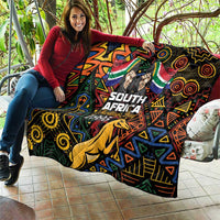 South Africa Heritage Day quilt with springbok motif and colorful geometric tribal pattern.