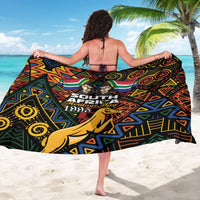 Black sarong viewed from back, South Africa Heritage Day graphic and geometric pattern.