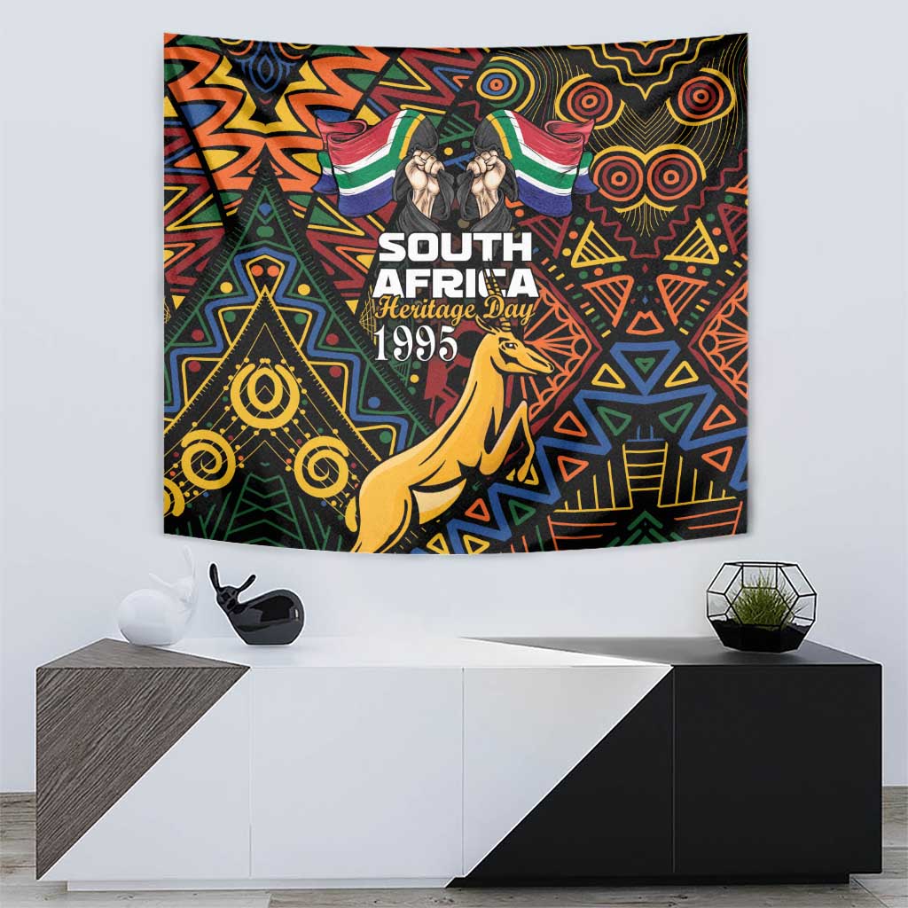Black heritage day tapestry with Springbok and colorful African geometric motifs on display