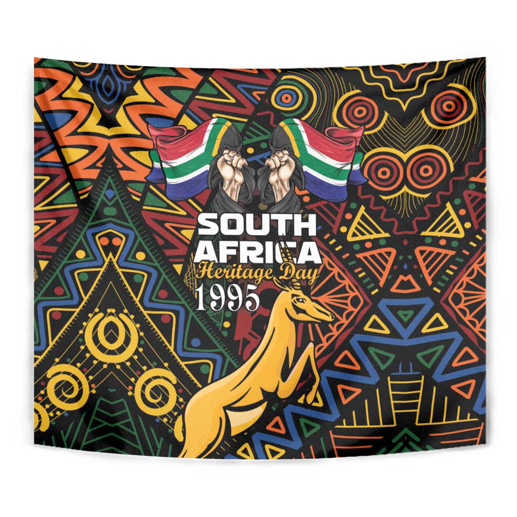 Black heritage day tapestry close-up with Springbok, flags, and bold geometric African design