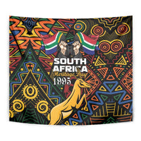 Black heritage day tapestry close-up with Springbok, flags, and bold geometric African design