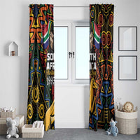 Pair of hanging African-pattern window curtains with colorful tribal artwork and springbok