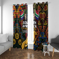 African-pattern window curtains with black background, bold colorful design and springbok