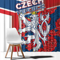 Close-up window curtain fabric with “CZECH REPUBLIC” text, lion, and red rose print