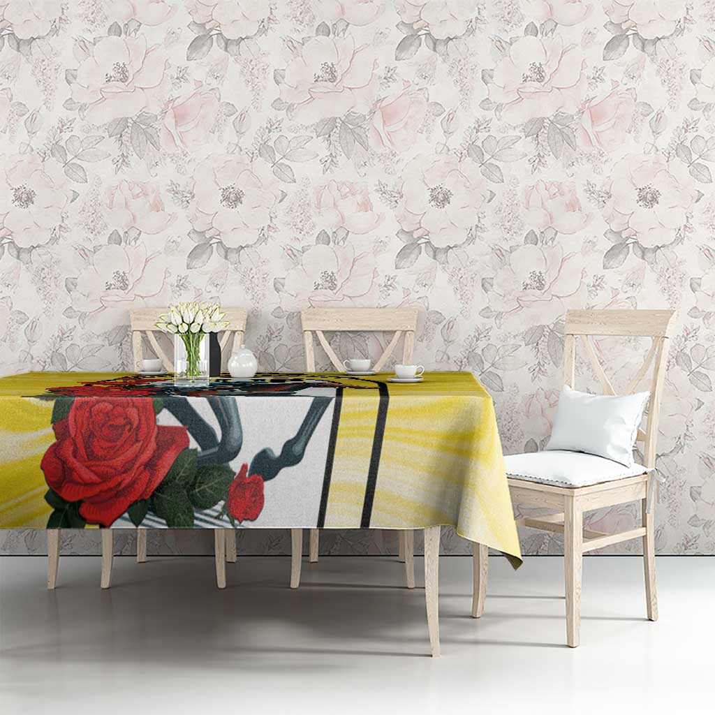 Yellow horse racing tablecloth with horse head, roses, and colorful Melbourne logo