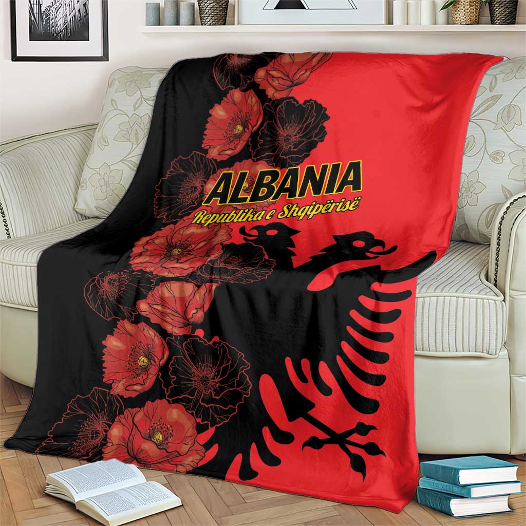 Albania-themed blanket on armchair in red and black with poppy floral eagle print