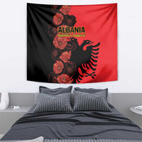 Albania tapestry with floral poppies on black side, red side, and eagle graphic centerpiece