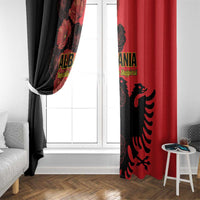 Red and black printed window curtain panel with poppy flowers and eagle emblem