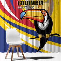 Close view of yellow toucan window curtain with blue and red stripe pattern.