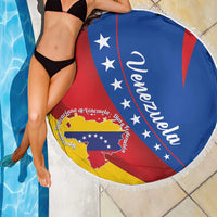 Venezuela round beach blanket with blue and red flag stripes and white fringe, by pool