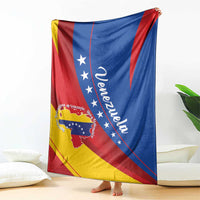 Folded Venezuela flag throw blanket showing star field, map graphic, and curved text